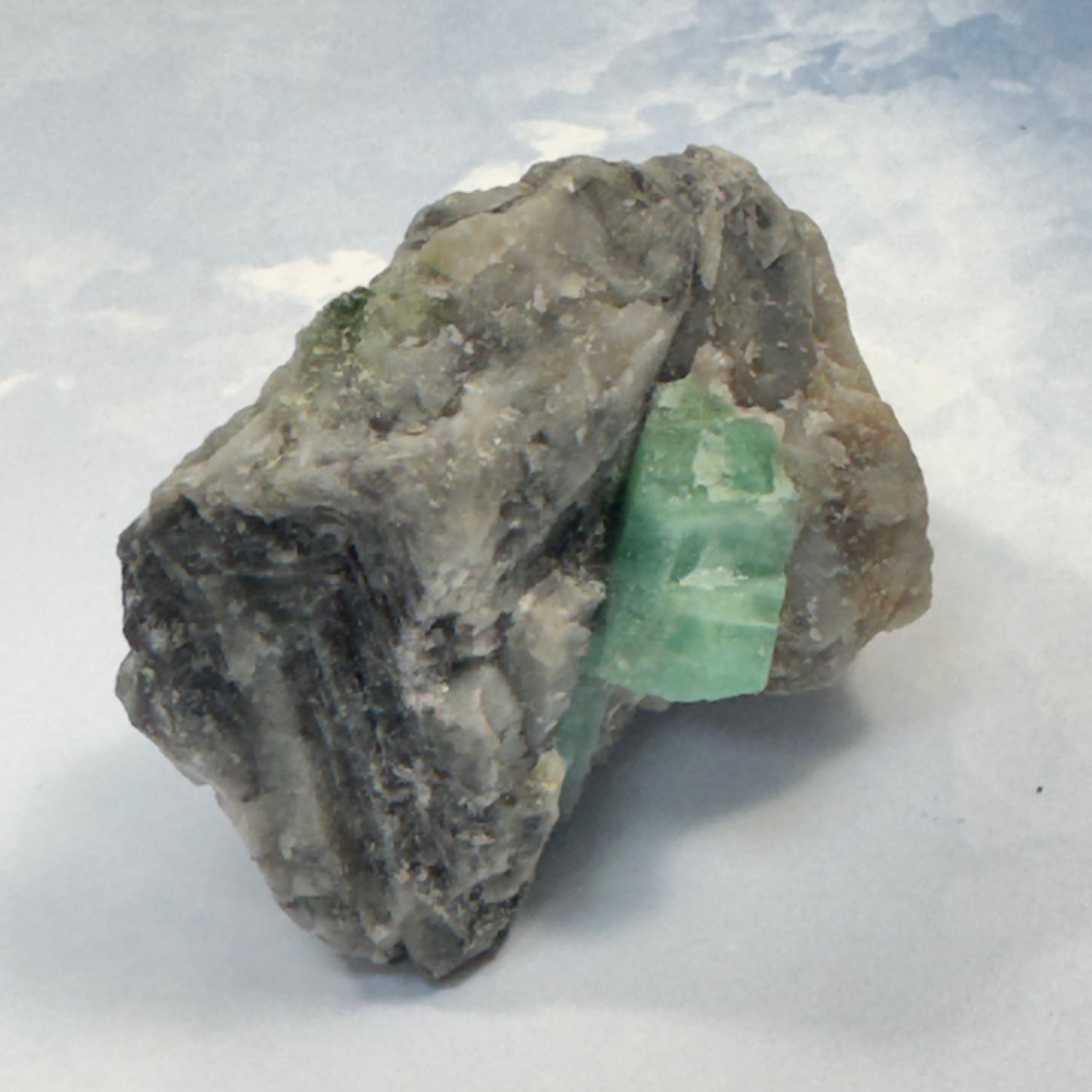 A video of a piece of natural real rough green emerald from Brazil