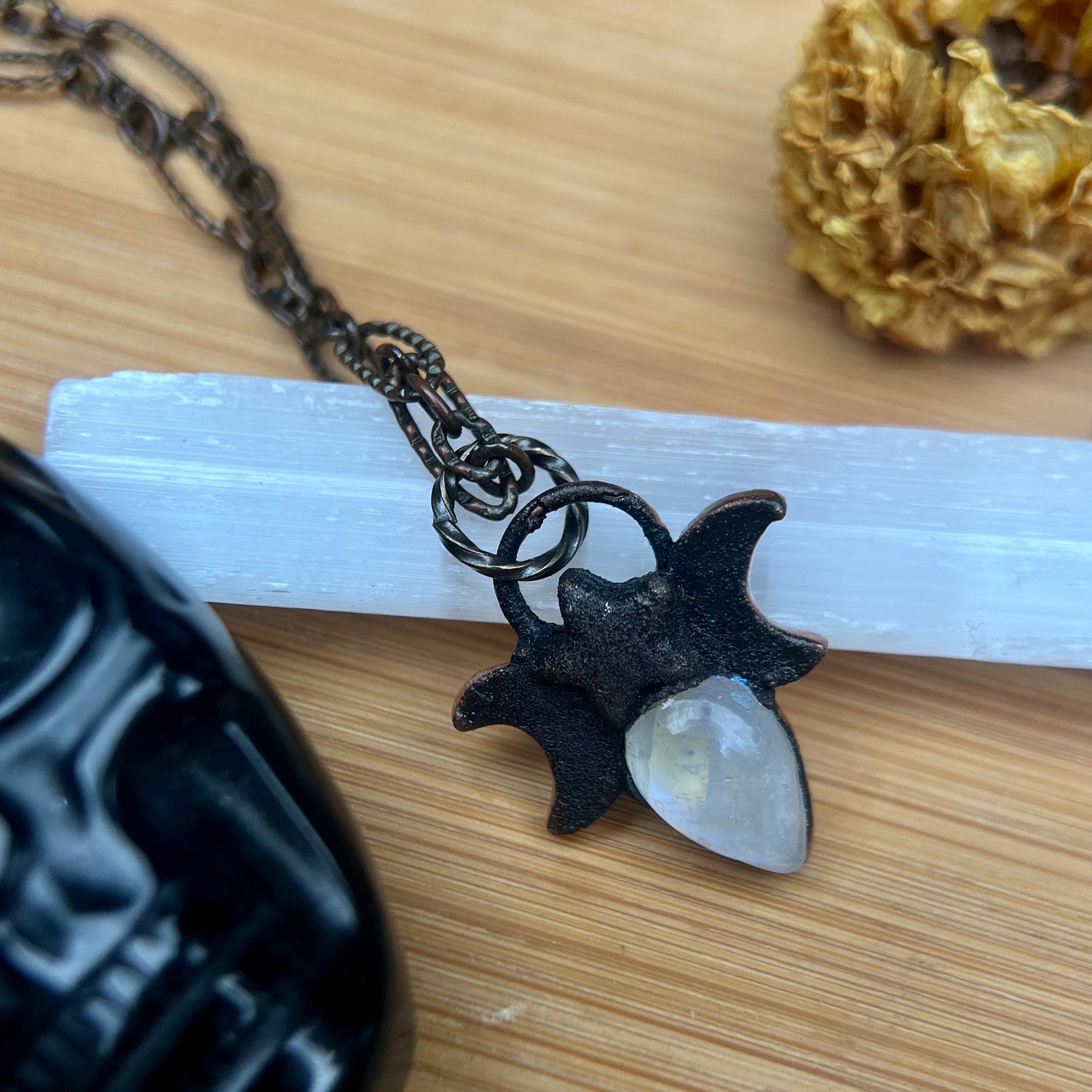 Moonstone crystal necklace for a green witch