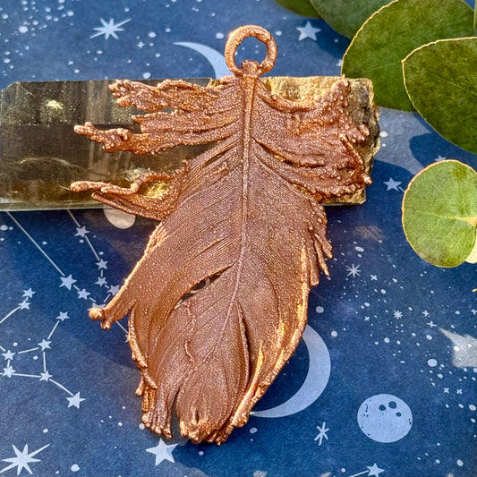 this is a electroformed copper feather boho necklace