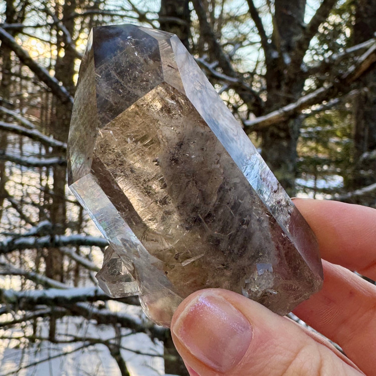 natural quartz point with inclusions smoky quartz crystal