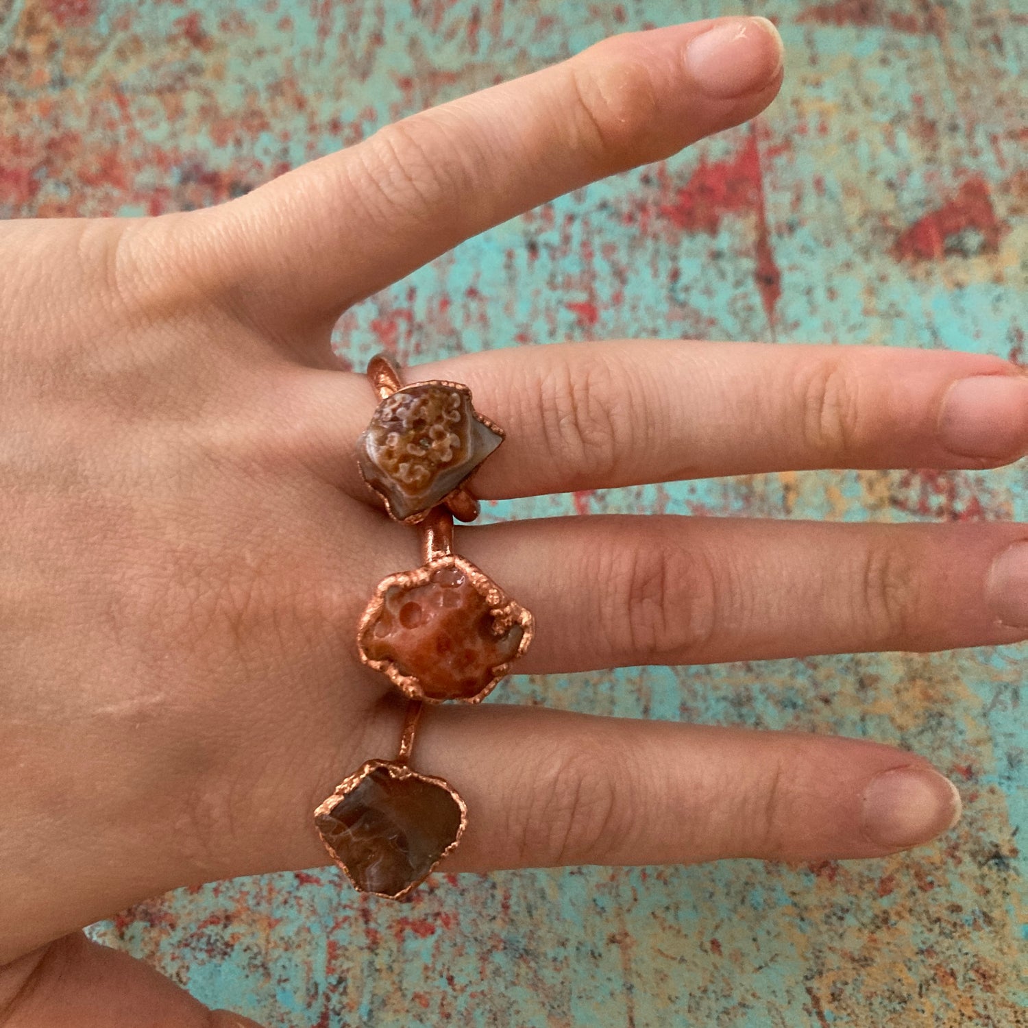 copper and agate crystal rings