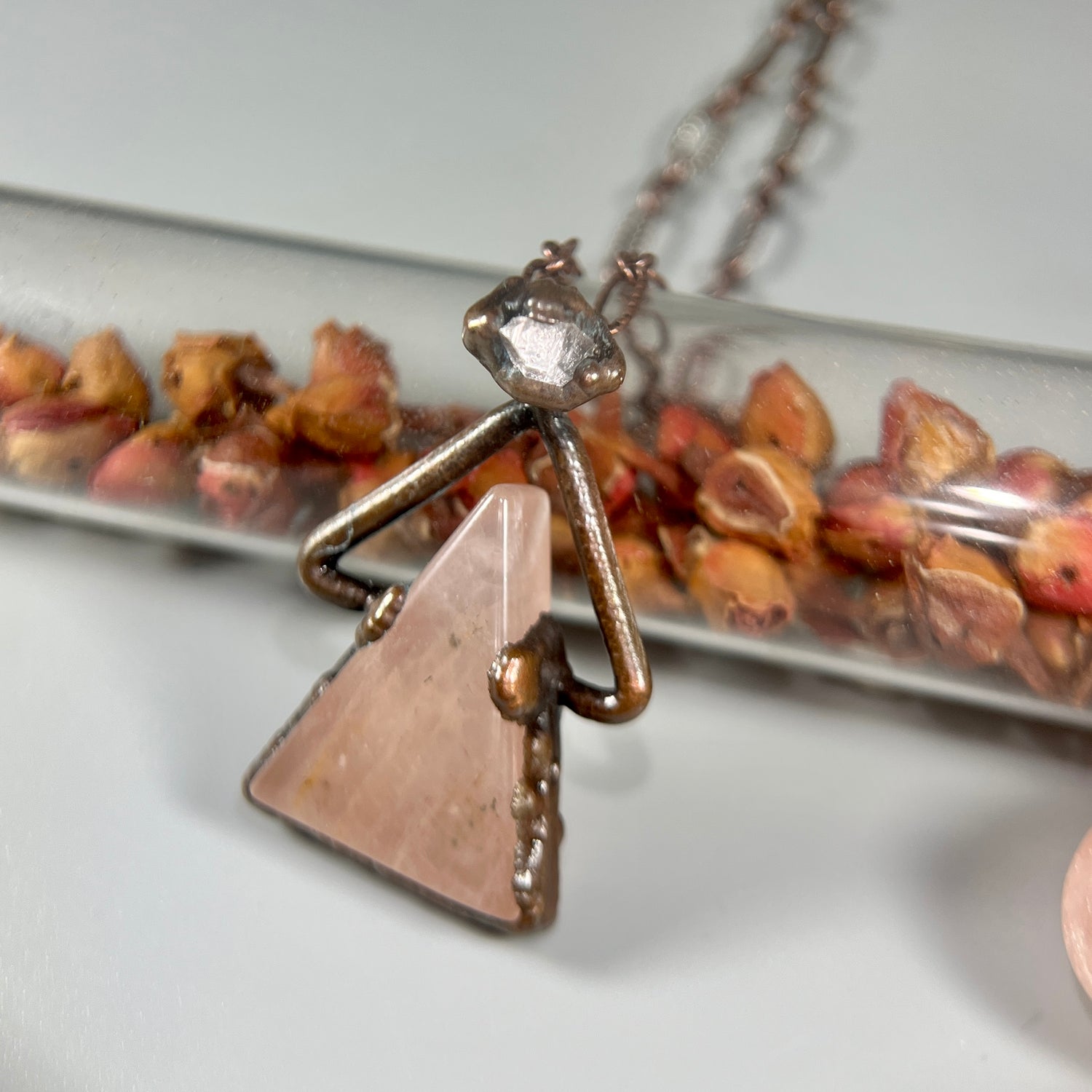rose quartz and herkimer quartz crystal pendant on a beautiful copper chain necklace.