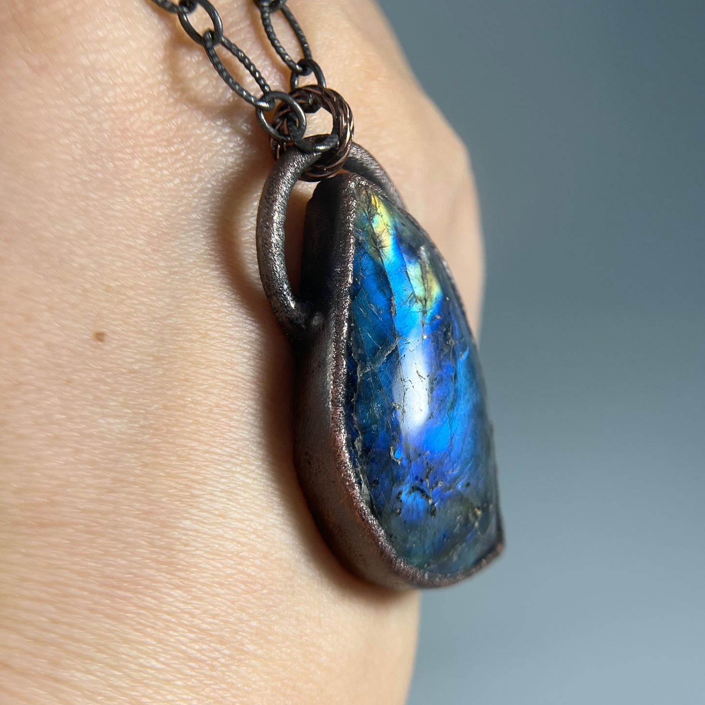 side view of the stunning labradorite crystal necklace.