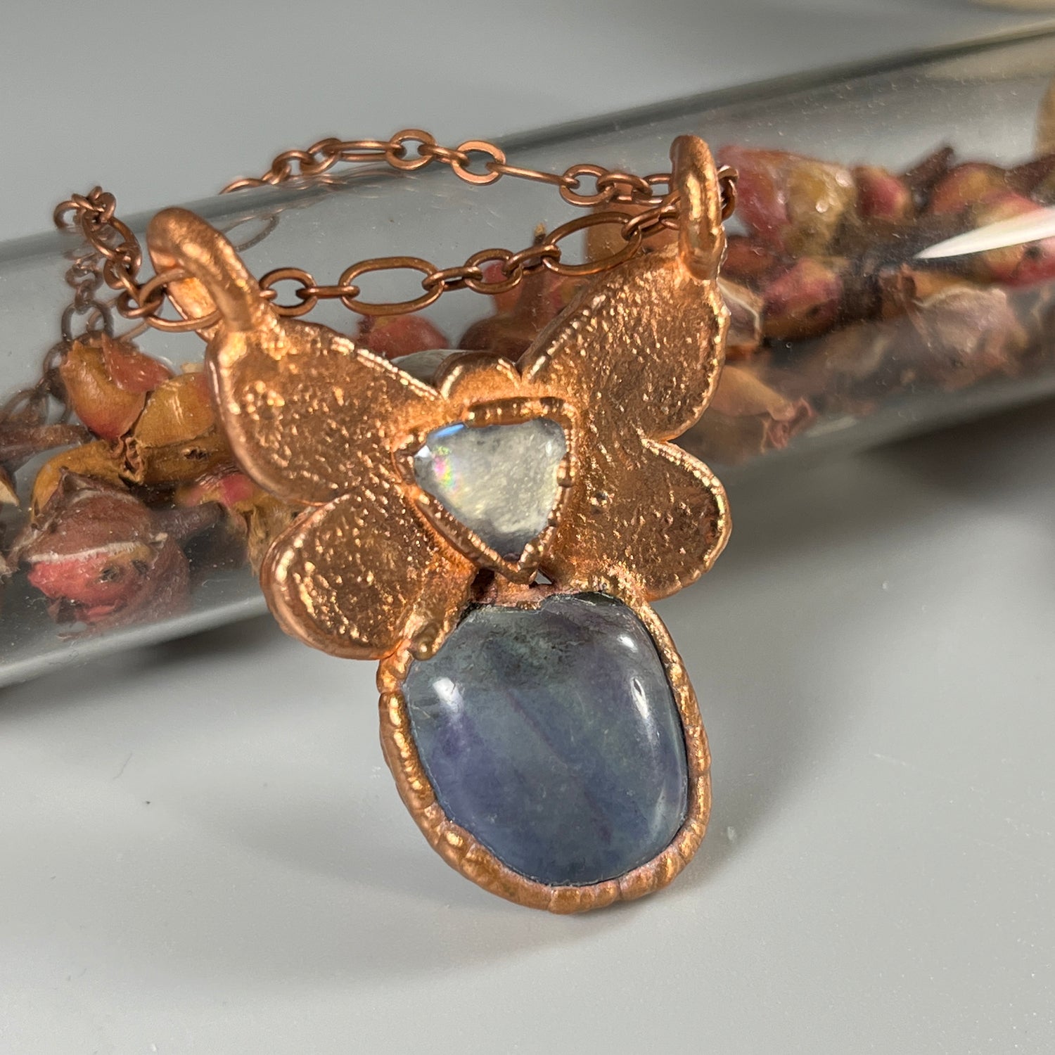 handmade crystal and copper butterfly pendant with a matching copper chain necklace.